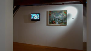 Exhibition view of a painting and a flatscreen.